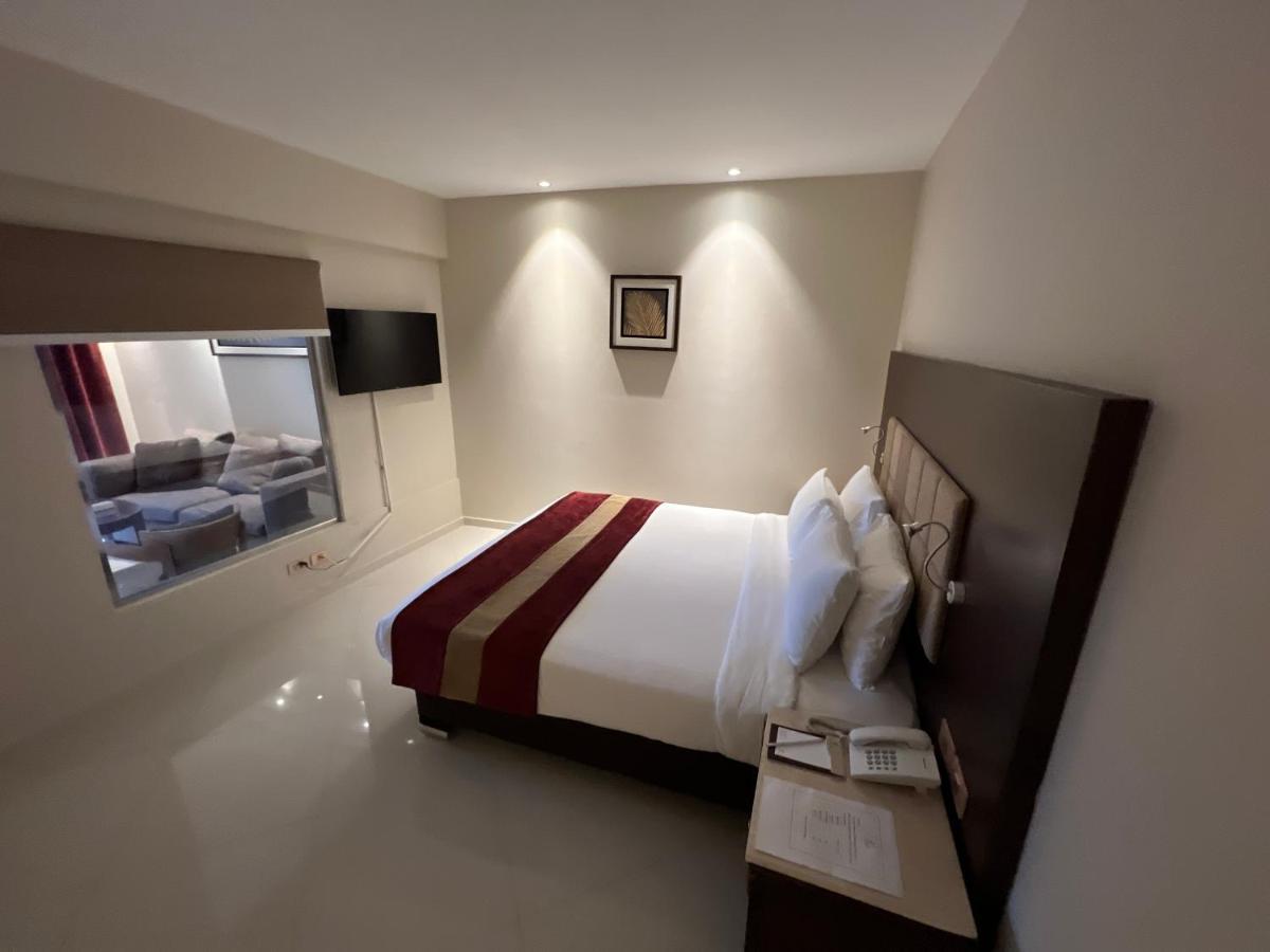 Hotel Grand Ocean El Sokhna Ain Soukhna Exteriér fotografie A bedroom at the hotel